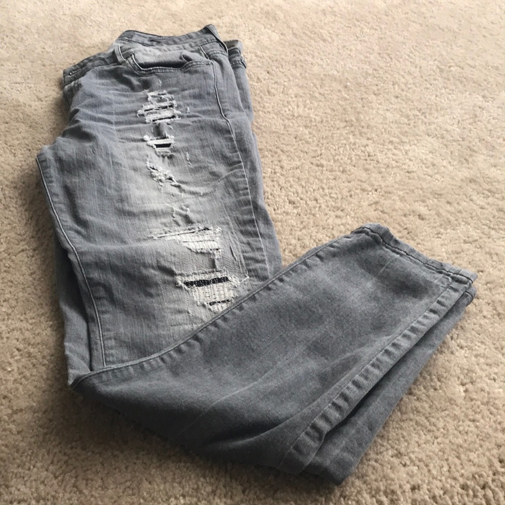 Distressed denim jeans